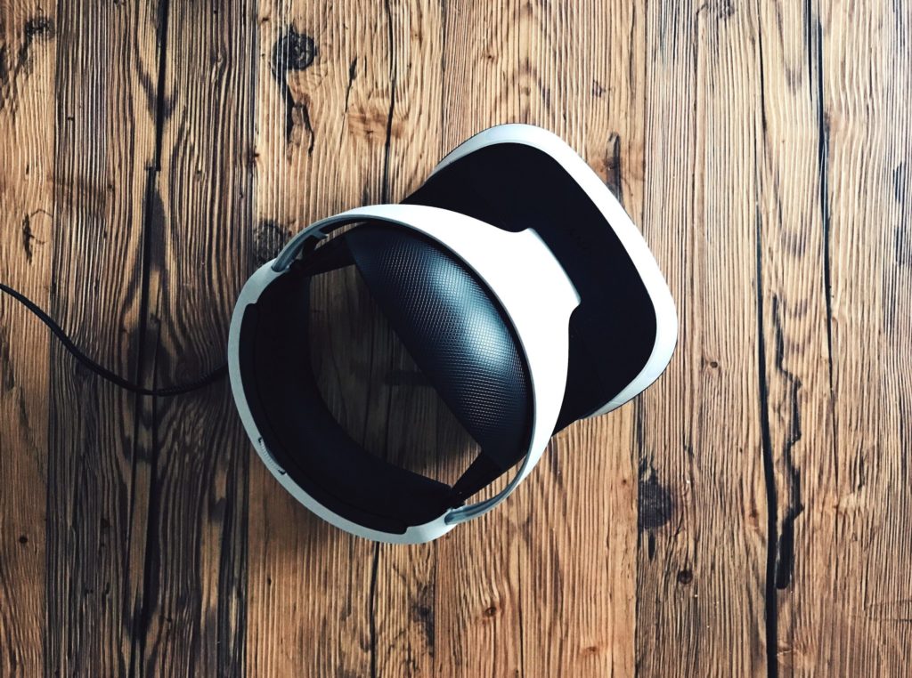 White & black VR headset upside down