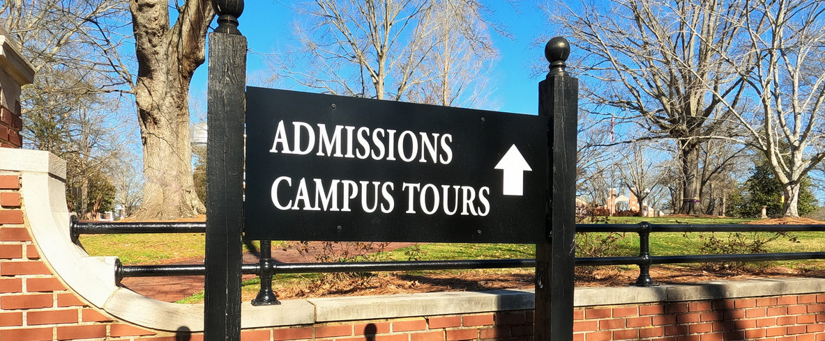 admissions campus tour sign