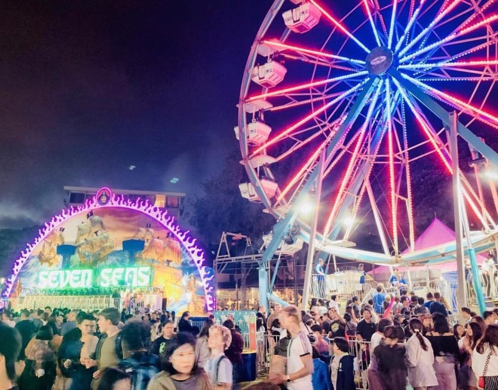 People are walking in the fair