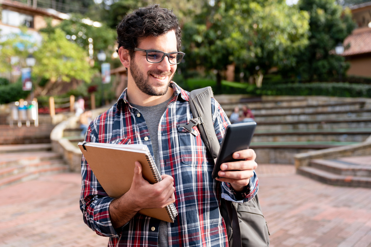 Senior college student using an interactive campus map to get real-time updates