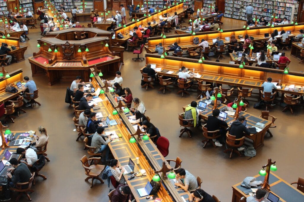 Students in college library