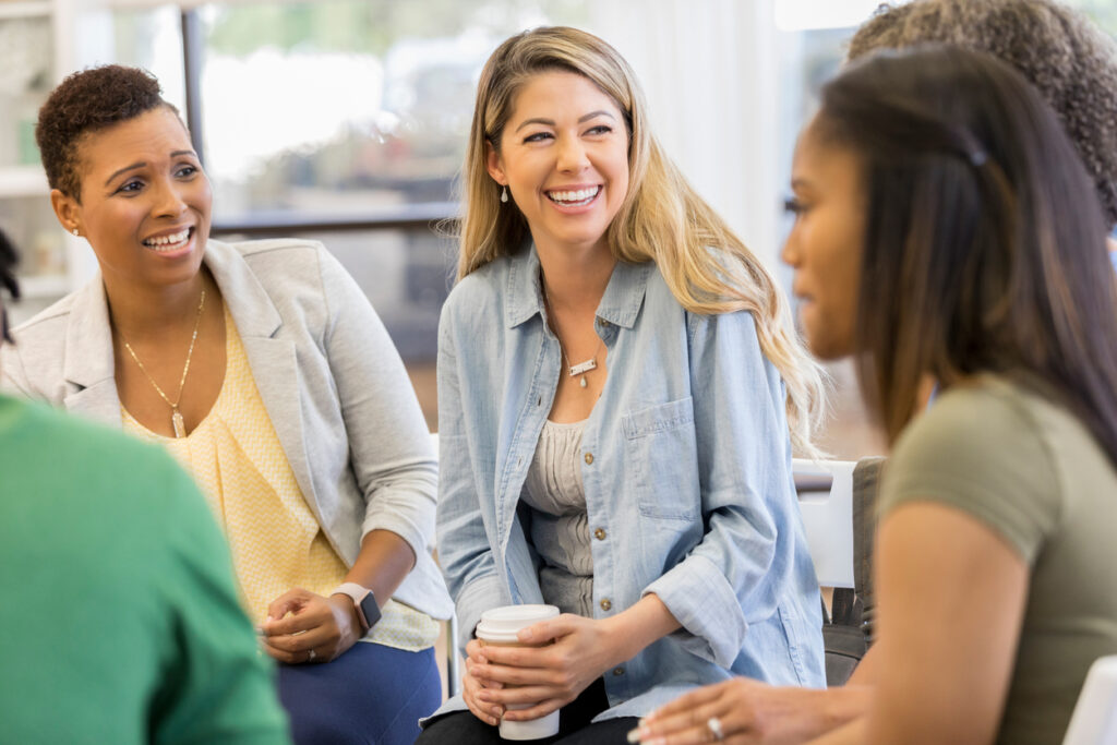 Parents of prospective students meeting and chatting, forming a sense of community