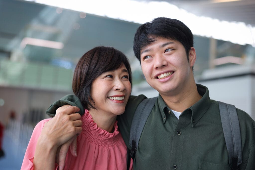 Mom and son spending time together at a Family Weekend on campus