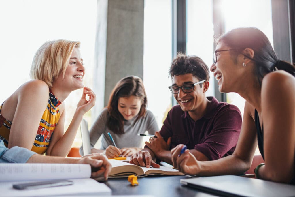 Group of friends avoiding student burnout by studying together