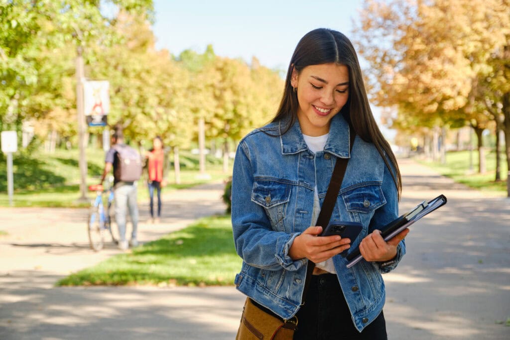 Prospective student using an interactive map to navigate campus