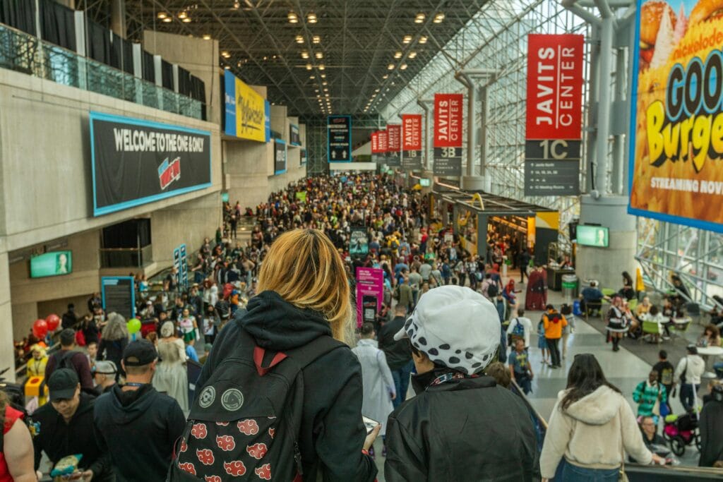 fans at a convention navigating their path