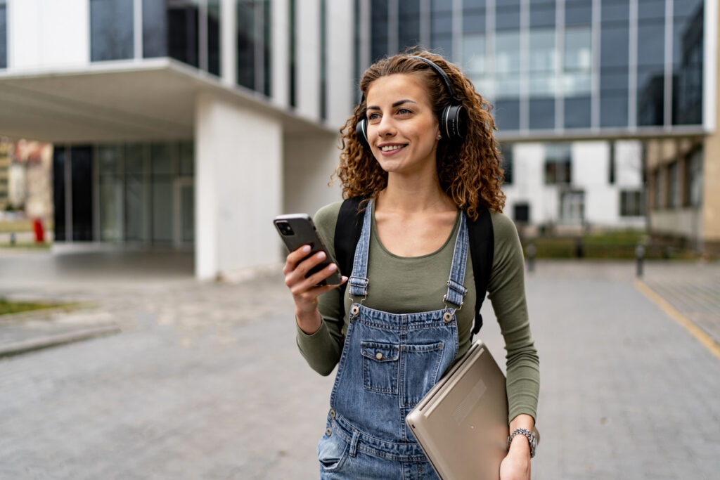 Student using a map on their phone to find their way to class