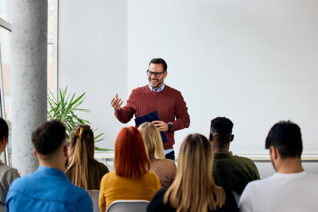 University staff holding a meeting in an optimal space by reserving through their  classroom utilization system
