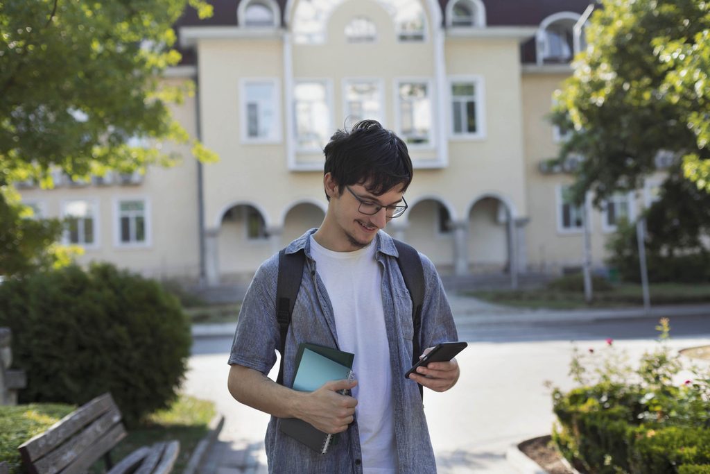 New student using positive digital campus experiences to explore academic and non-academic groups
