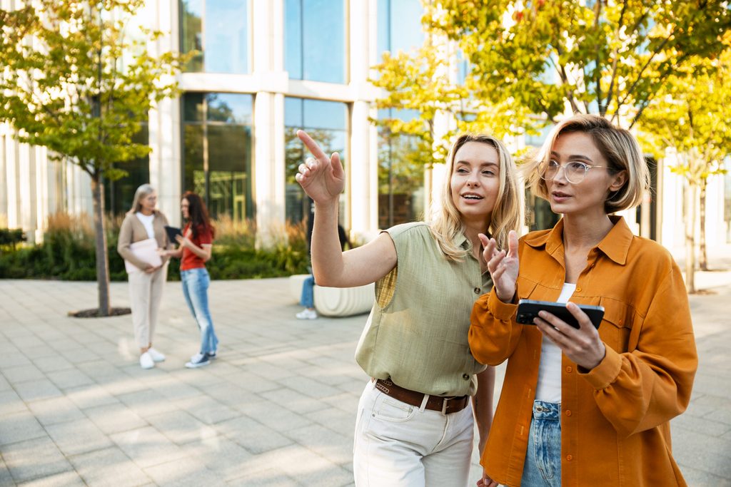 Students avoiding sidewalk closures with a digital campus navigation map